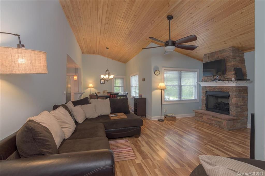 2500 Catawba River Road Old Fort, NC 28762 - Photo 7 of 24 a living room with furniture and a fireplace