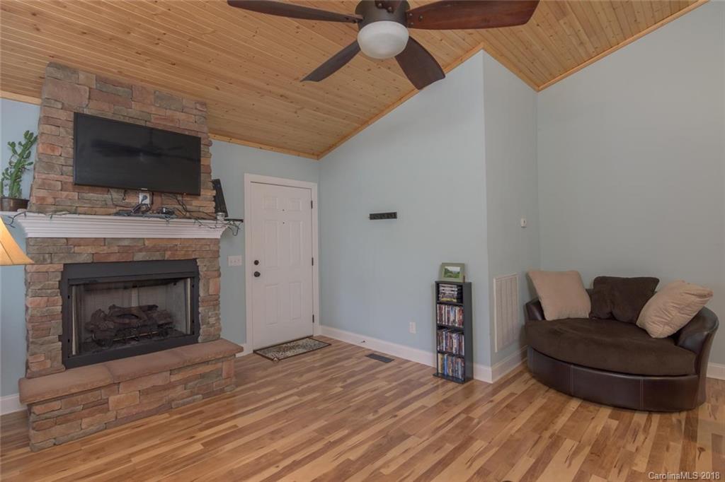 2500 Catawba River Road Old Fort, NC 28762 - Photo 9 of 24 a living room with furniture and a fireplace