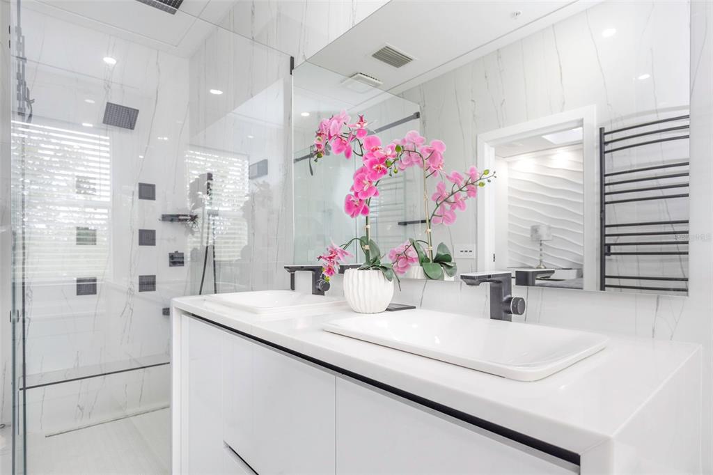 7130 102nd Lane Seminole, FL 33772 - Photo 17 of 31 a bathroom with a sink vanity and a mirror