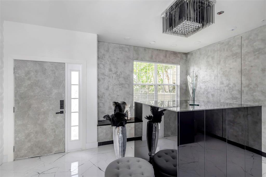 7130 102nd Lane Seminole, FL 33772 - Photo 24 of 31 a living room with furniture and a large window