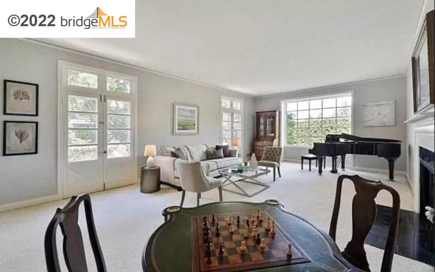515 Hampton Road Piedmont, CA 94611 - Photo 3 of 13 a living room with furniture and a large window
