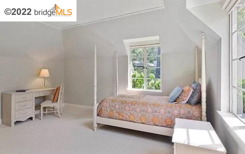 515 Hampton Road Piedmont, CA 94611 - Photo 8 of 13 a bedroom with a bed and a window