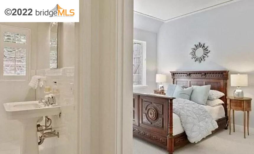 515 Hampton Road Piedmont, CA 94611 - Photo 10 of 13 a bedroom with a bed and a table