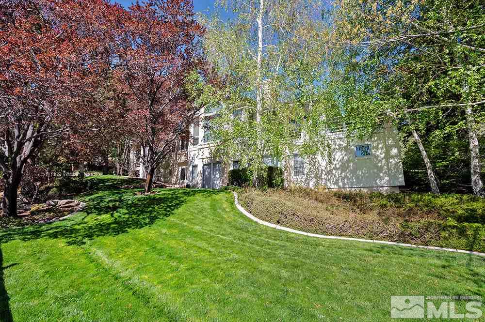 4278 Bitteroot Road Reno, NV 89519 - Photo 27 of 29 a view of a backyard with large trees