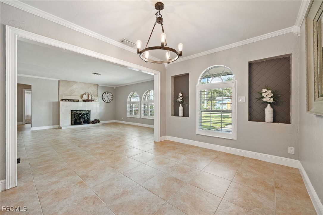 8327 Riviera Avenue Fort Myers, FL 33919 - Photo 13 of 49 a view of an empty room with a window
