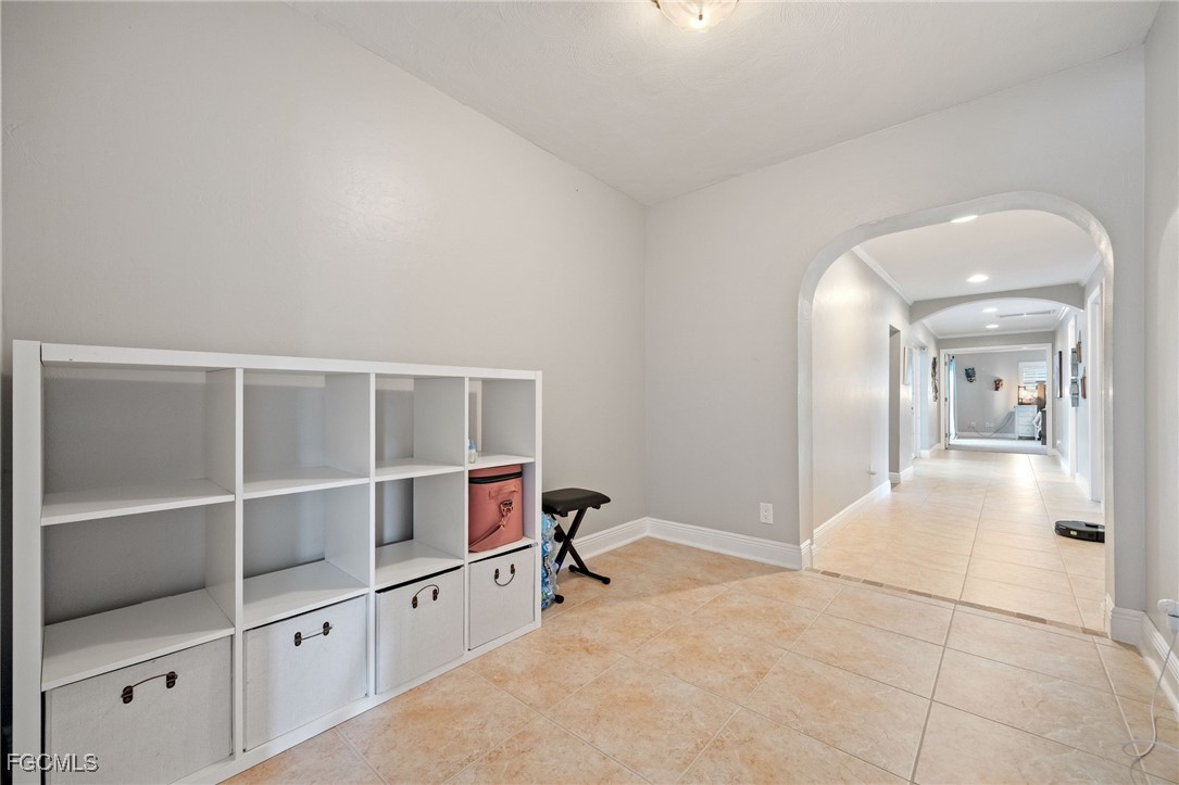 8327 Riviera Avenue Fort Myers, FL 33919 - Photo 24 of 49 a view of a hallway with workspace