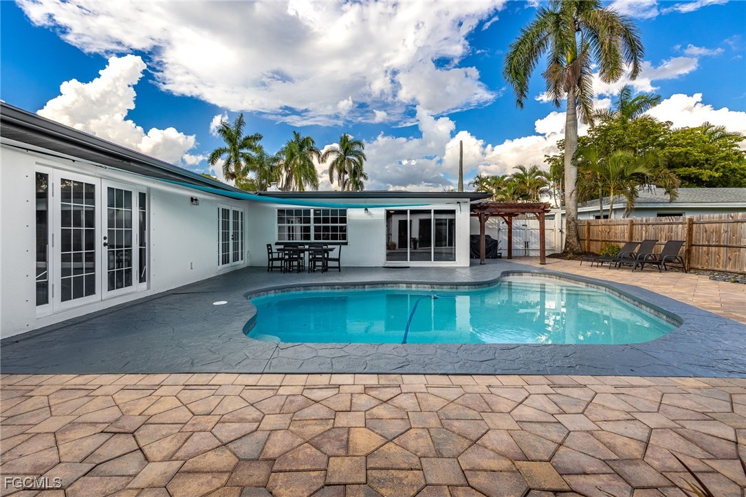 8327 Riviera Avenue Fort Myers, FL 33919 - Photo 45 of 49 a view of a house with a backyard