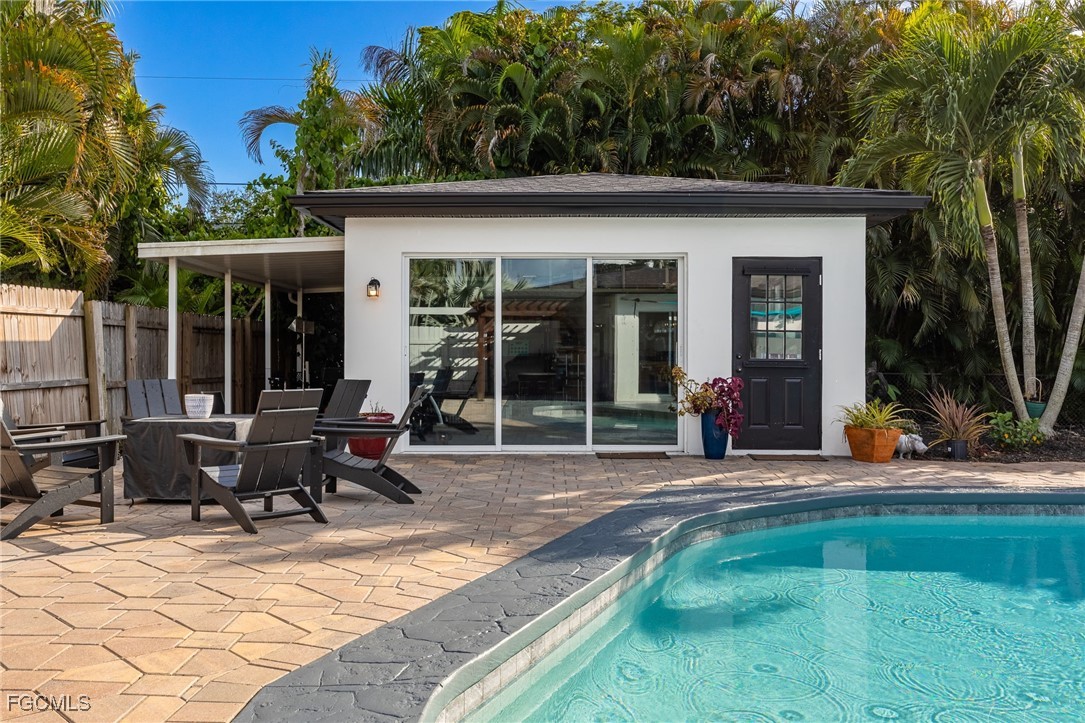 8327 Riviera Avenue Fort Myers, FL 33919 - Photo 46 of 49 a view of a house with backyard porch and sitting area