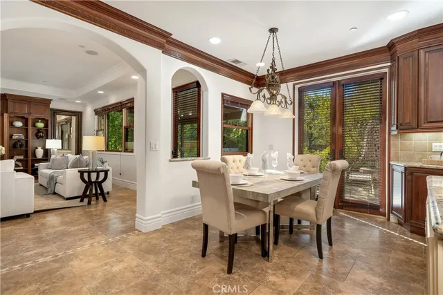 a bathroom with a sink mirror vanity and toilet