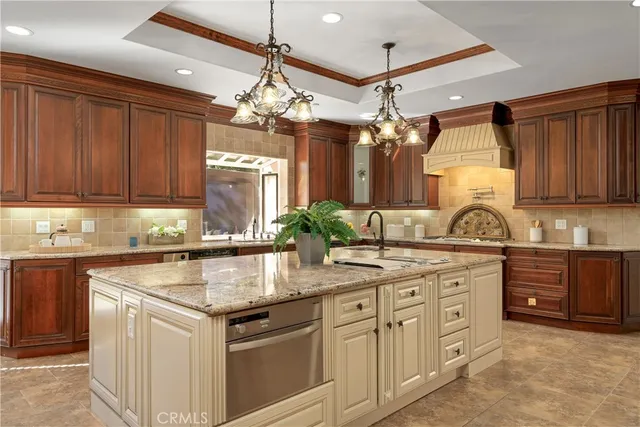 a spacious bedroom with a large bed and a ceiling fan