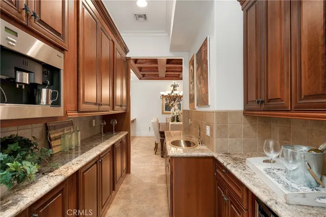 a spacious bathroom with a tub sink and mirror