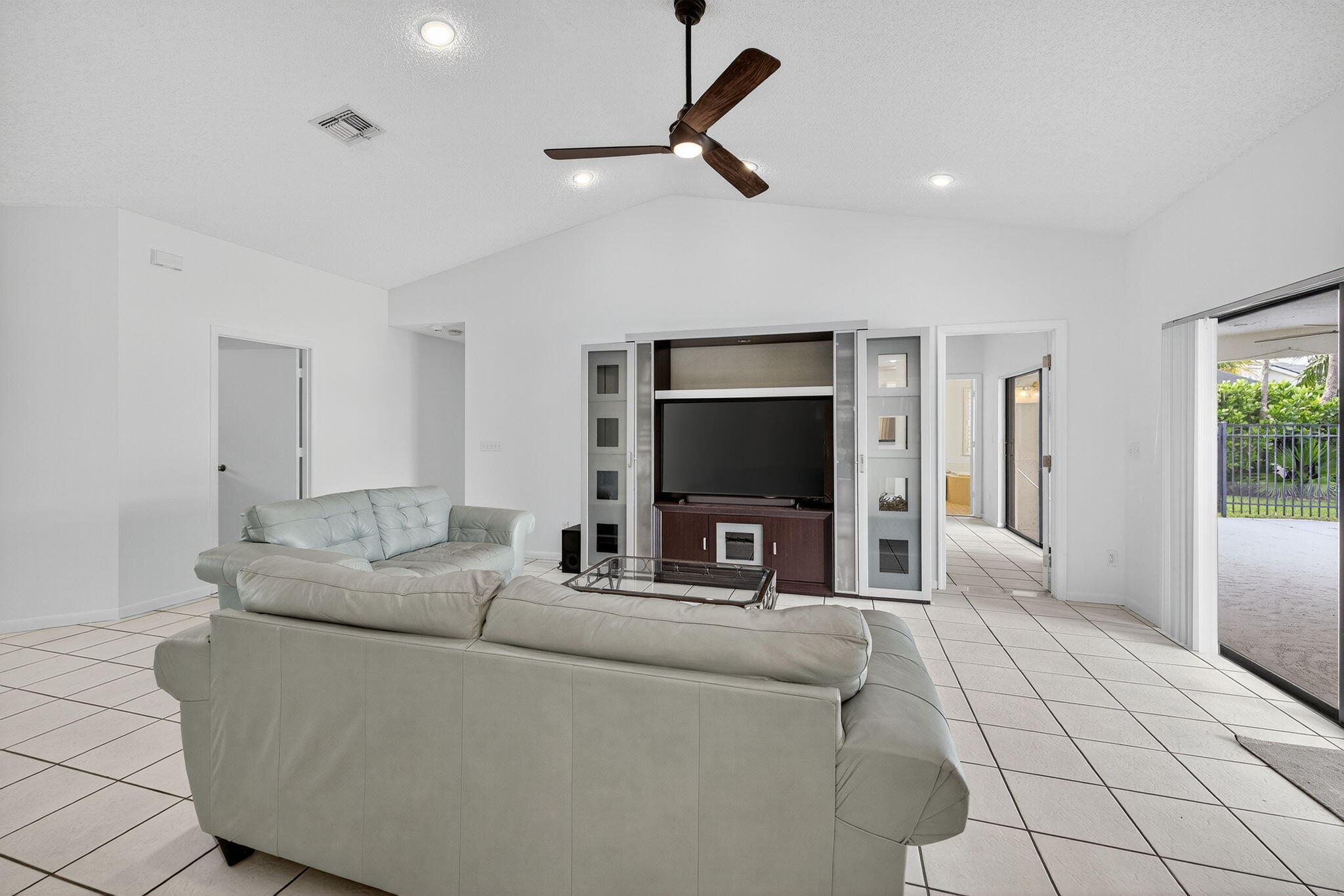 3140 Old Orchard Road Davie, FL 33328 - Photo 11 of 41 a living room with furniture and a flat screen tv