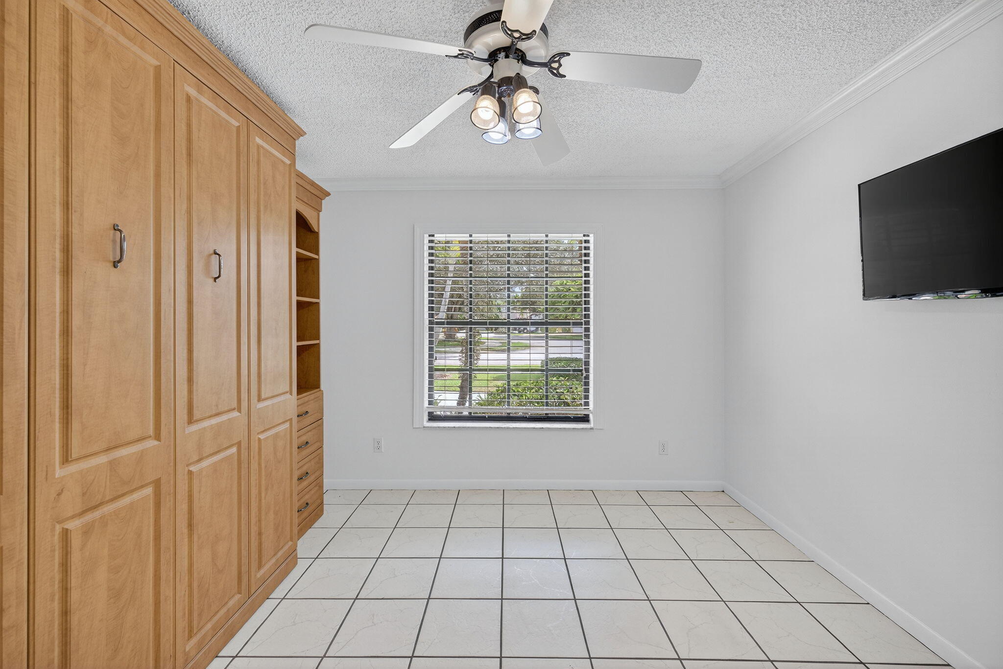 3140 Old Orchard Road Davie, FL 33328 - Photo 17 of 41 a view of an empty room with a window and a kitchen