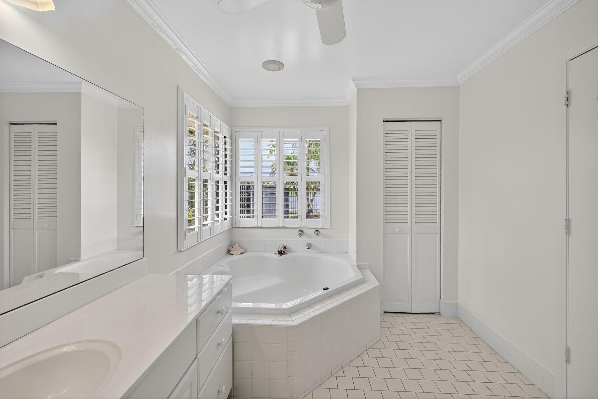 3140 Old Orchard Road Davie, FL 33328 - Photo 26 of 41 a bathroom with a bathtub and a sink