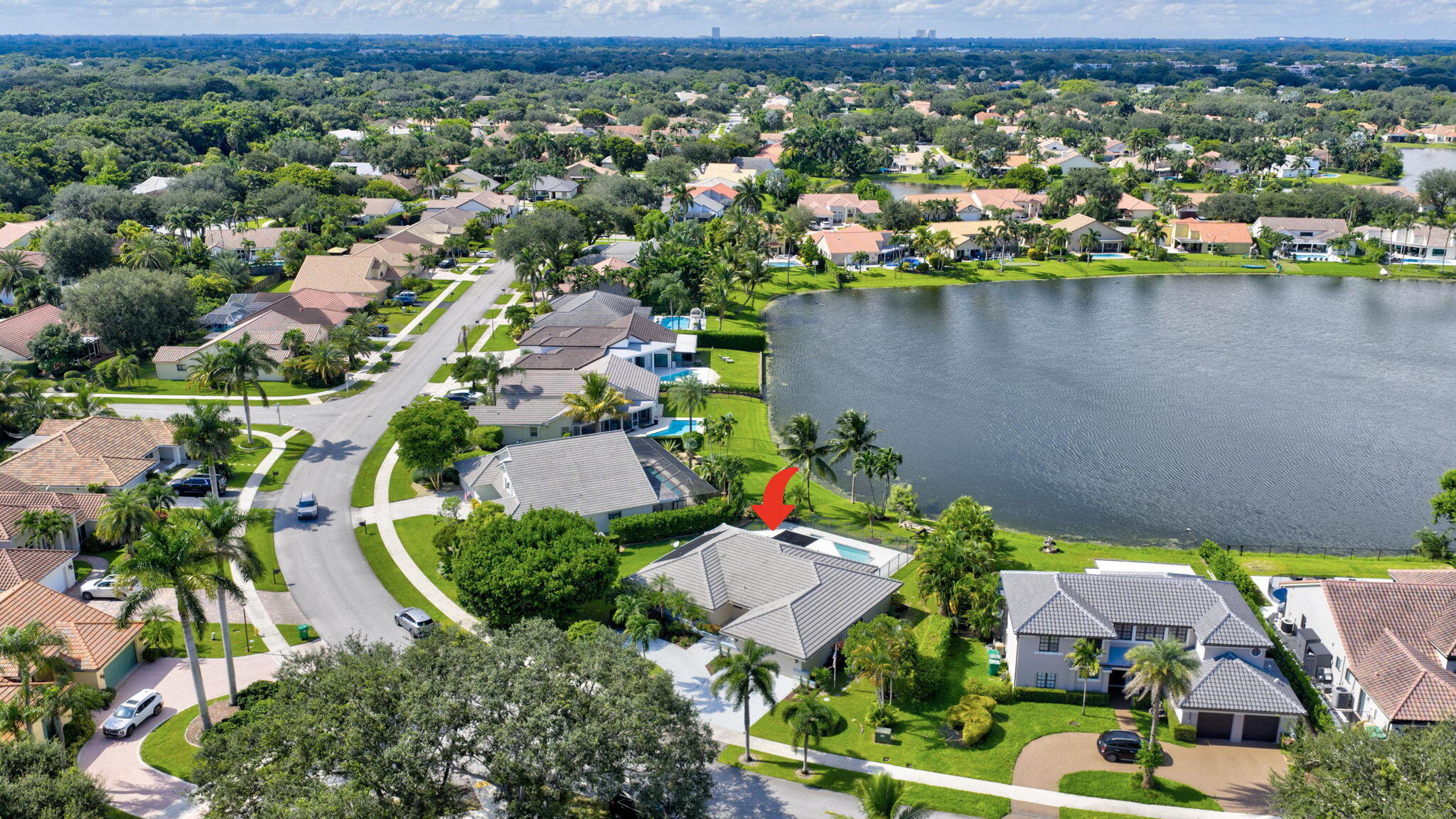 3140 Old Orchard Road Davie, FL 33328 - Photo 40 of 41 an aerial view of a house with a lake view