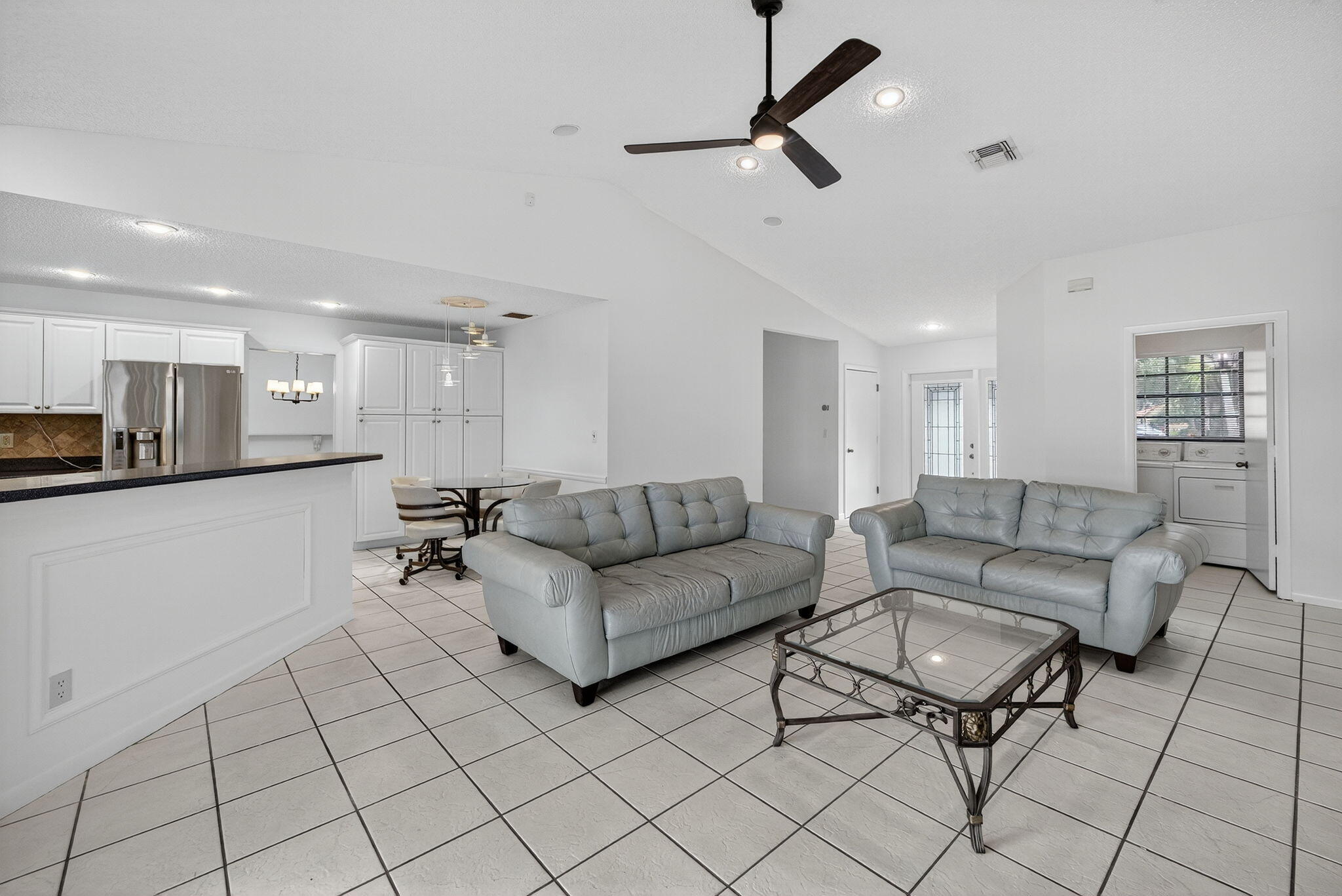 3140 Old Orchard Road Davie, FL 33328 - Photo 10 of 41 a living room with furniture and a view of kitchen
