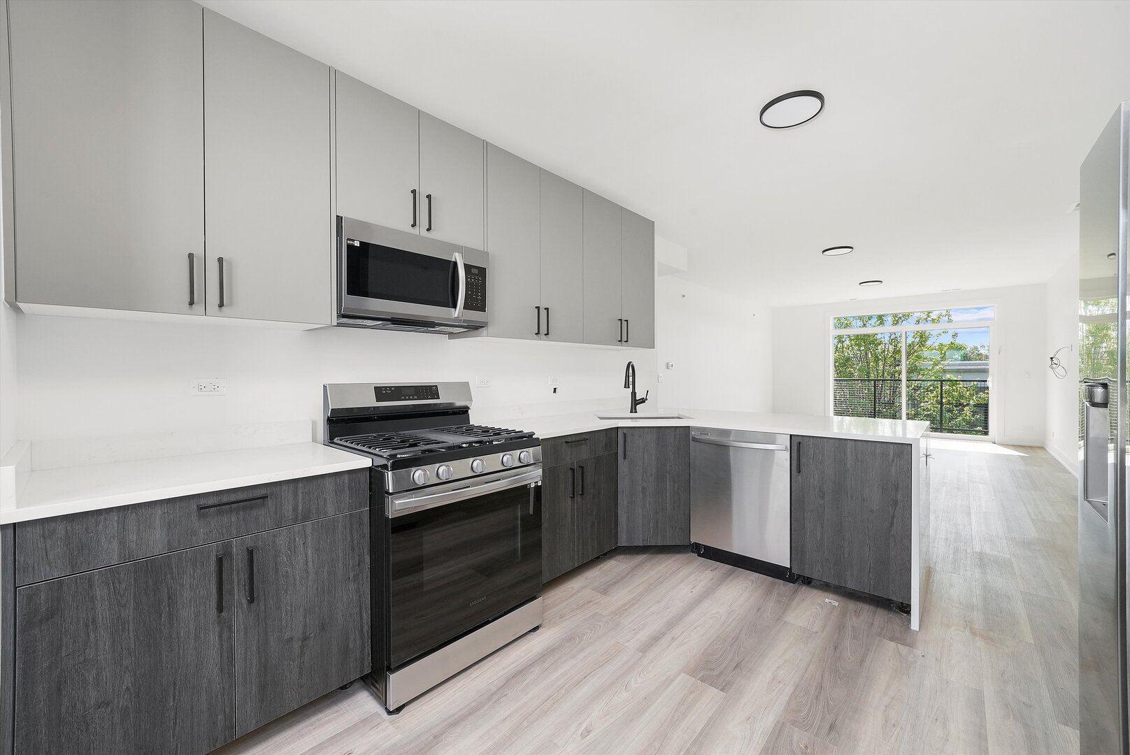 2030 Greenwood Street, Unit 206 Evanston, IL 60201 - Photo 2 of 27 a kitchen with a cabinets and steel stainless steel appliances
