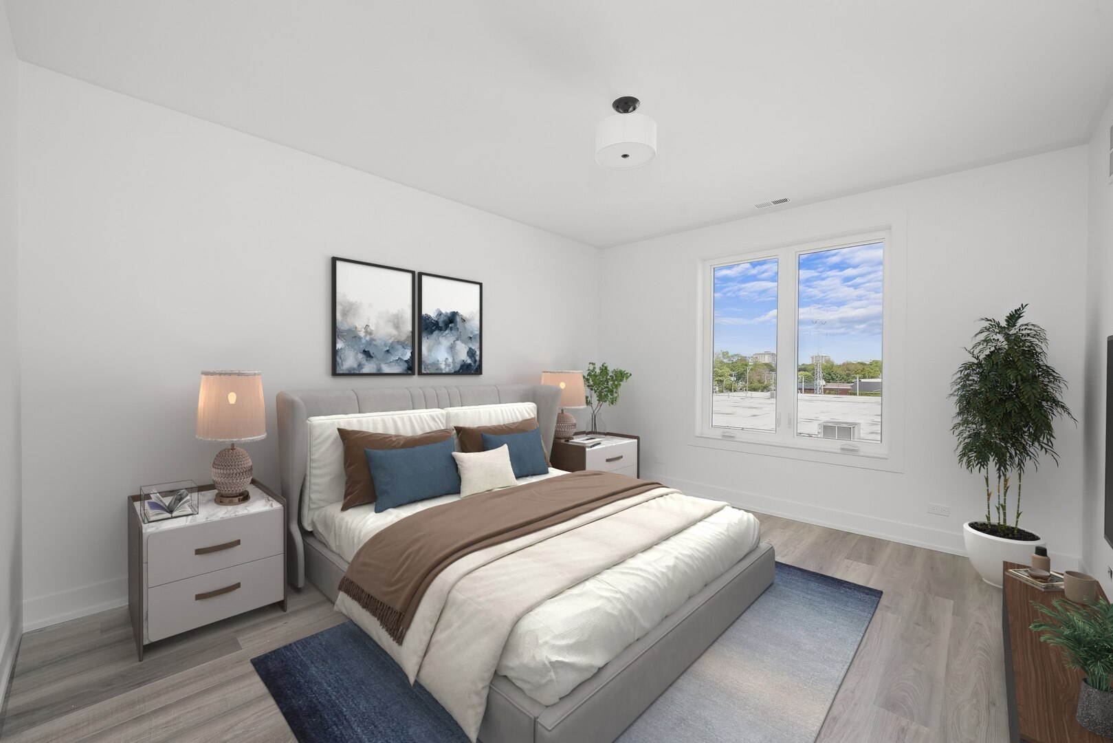 2030 Greenwood Street, Unit 206 Evanston, IL 60201 - Photo 21 of 27 a bedroom with a bed and a potted plant