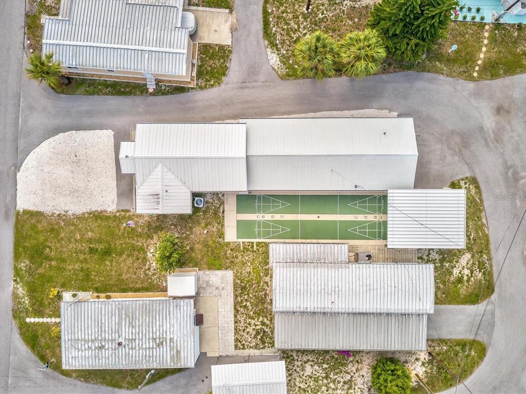 5642 Oak Ridge Avenue New Port Richey, FL 34652 - Photo 21 of 44 a picture of a bench in front of a building