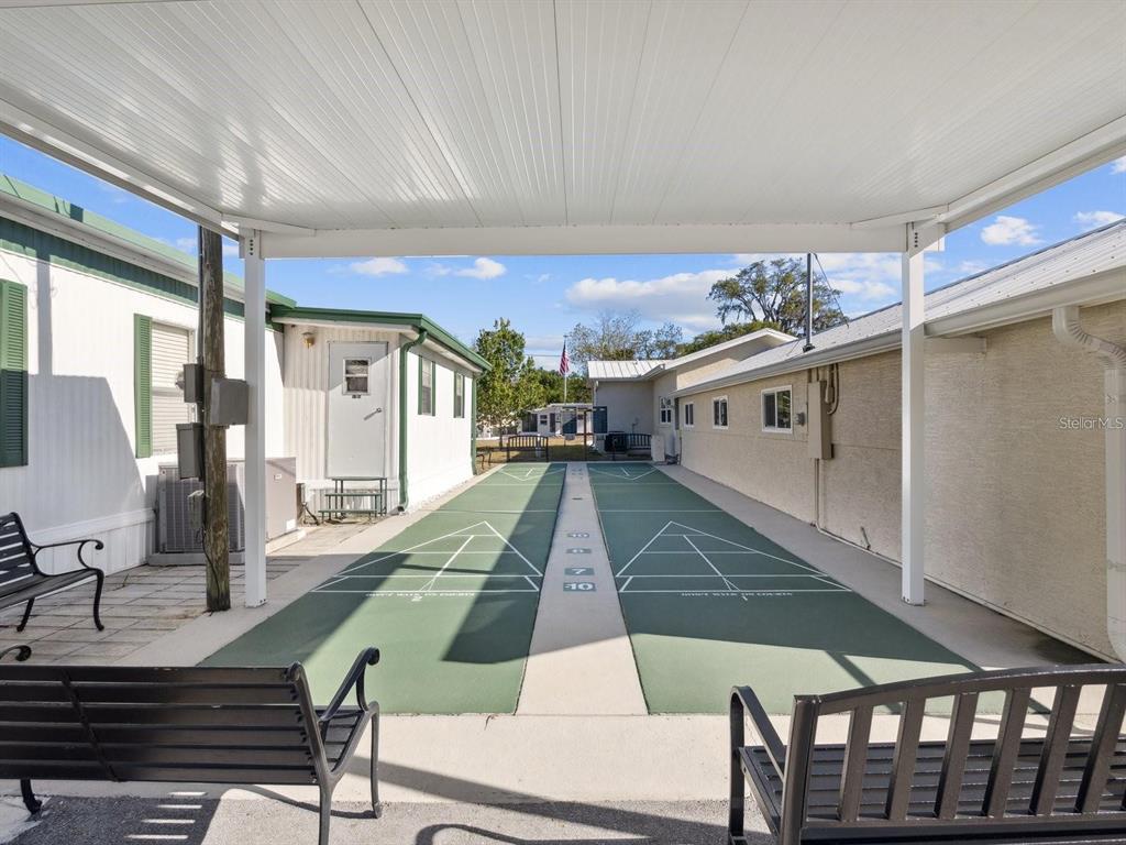 5642 Oak Ridge Avenue New Port Richey, FL 34652 - Photo 24 of 44 a view of a living room and dining room