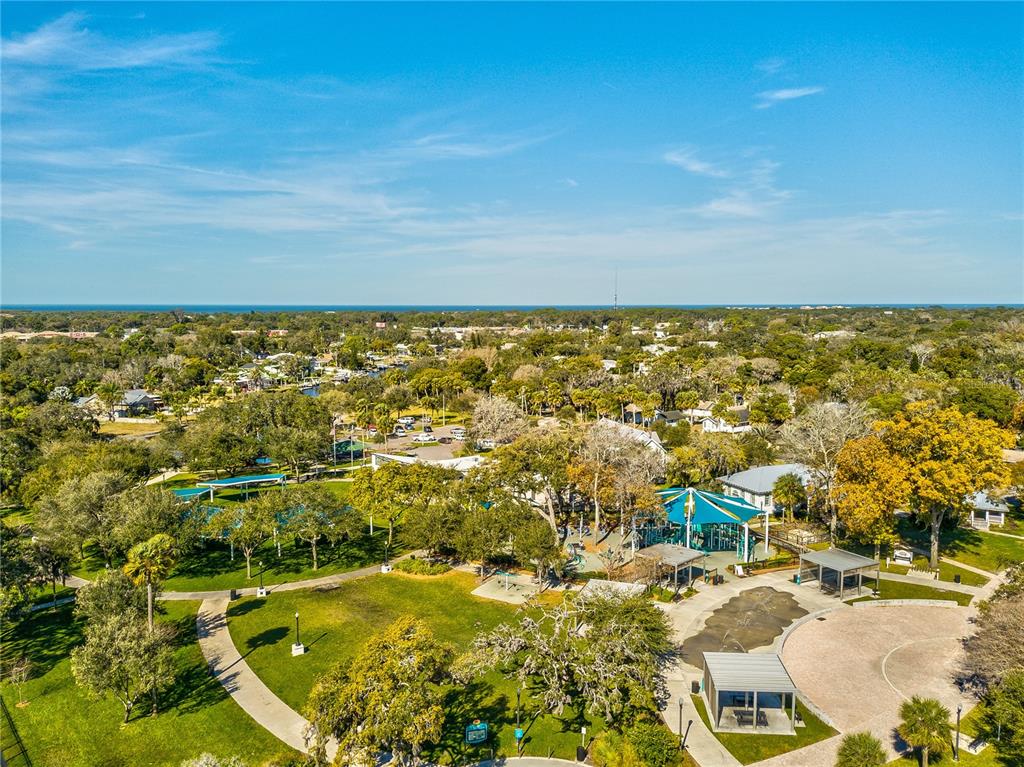 5642 Oak Ridge Avenue New Port Richey, FL 34652 - Photo 36 of 44 an aerial view of residential houses with outdoor space
