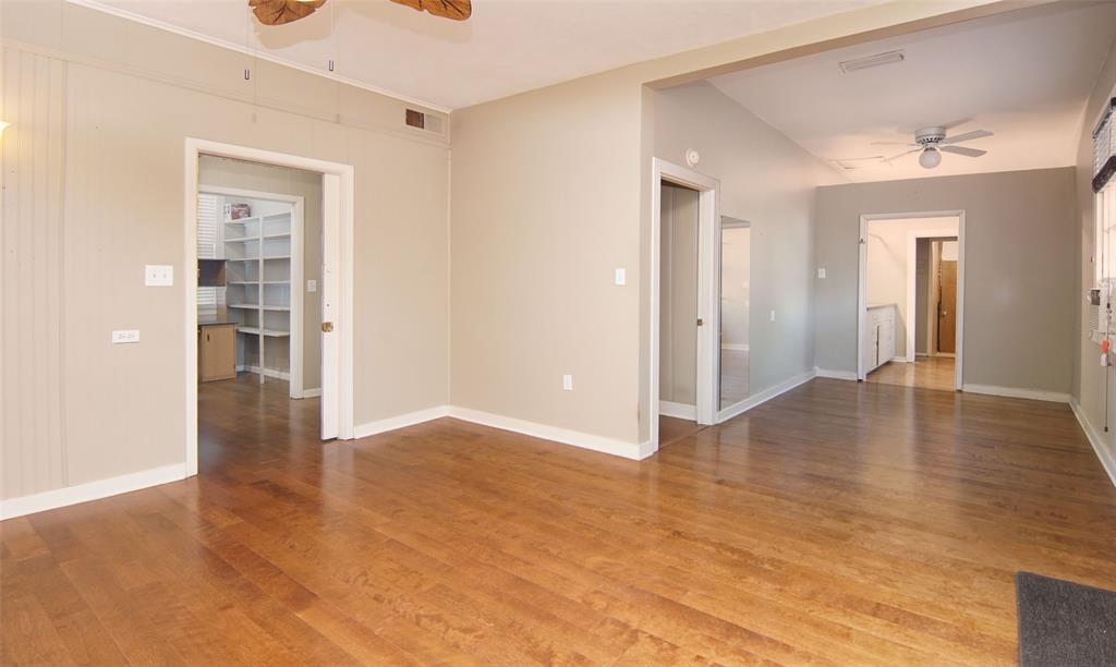 730 Indiana Street Graham, TX 76450 - Photo 14 of 25 wooden floor in an empty room