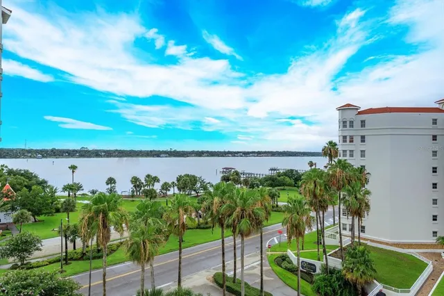 a view of a lake with a big yard