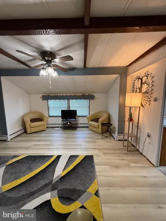 a kitchen with a table and chairs