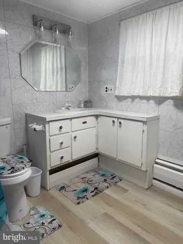 a utility room with washer and dryer