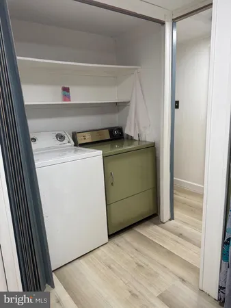 a utility room with washer and dryer