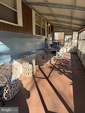 a view of a livingroom with furniture