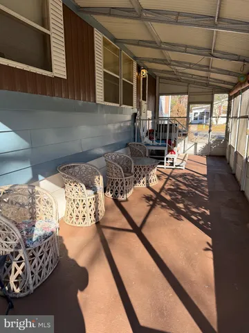 a view of a livingroom with furniture