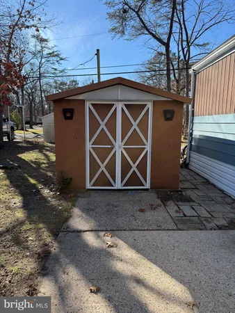 a view of outdoor space with wooden fence