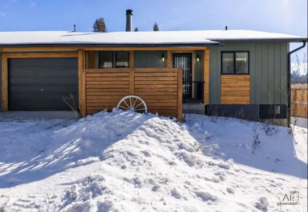 a view of a house with a yard and garage
