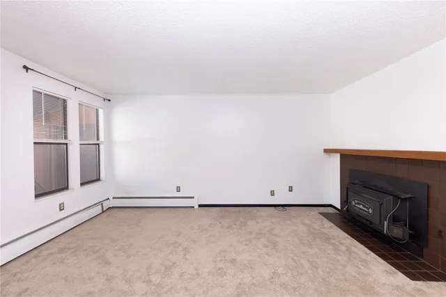 an empty room with cabinet