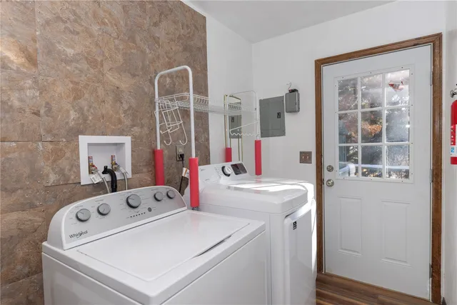 a utility room with dryer and washer