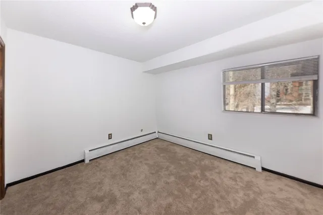 an empty room with a workbench