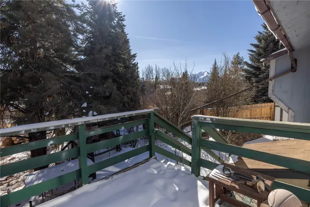 a view of a backyard of the house