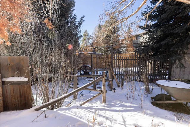 a view of a bench in backyard