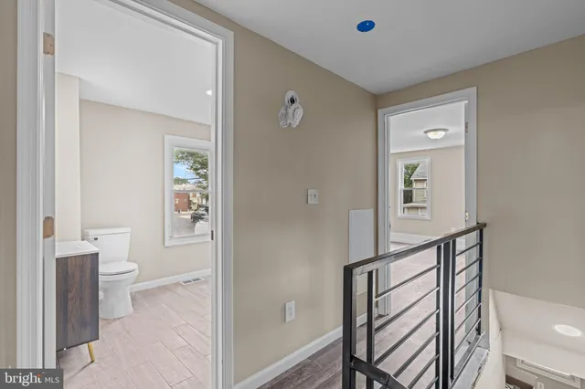 a view of a bathroom from the hallway