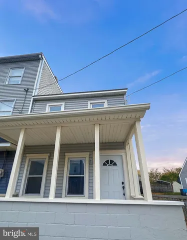 a view of a house with a porch