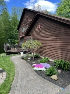 72 Pinnacle Road Ellington, CT 06029 - Photo 3 of 38 a backyard of a house with barbeque oven