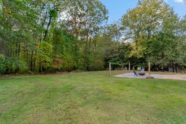 a front of a house with a garden
