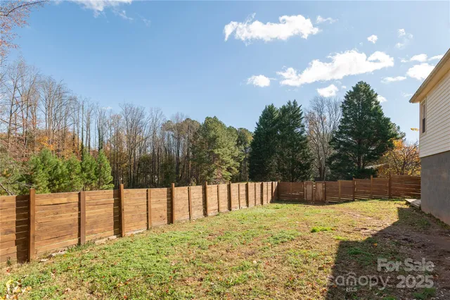 a view of a swimming pool with an outdoor space and seating area