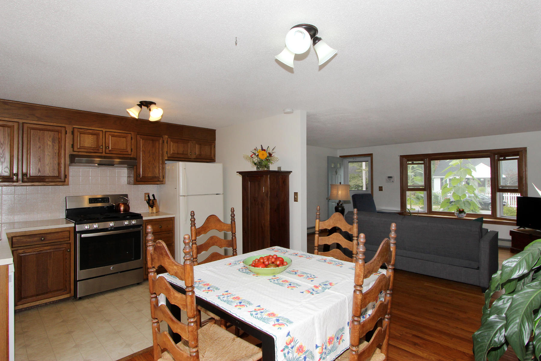 58 Colburne Path West Yarmouth, MA 02673 - Photo 15 of 39 a view of a dining room with furniture window and wooden floor