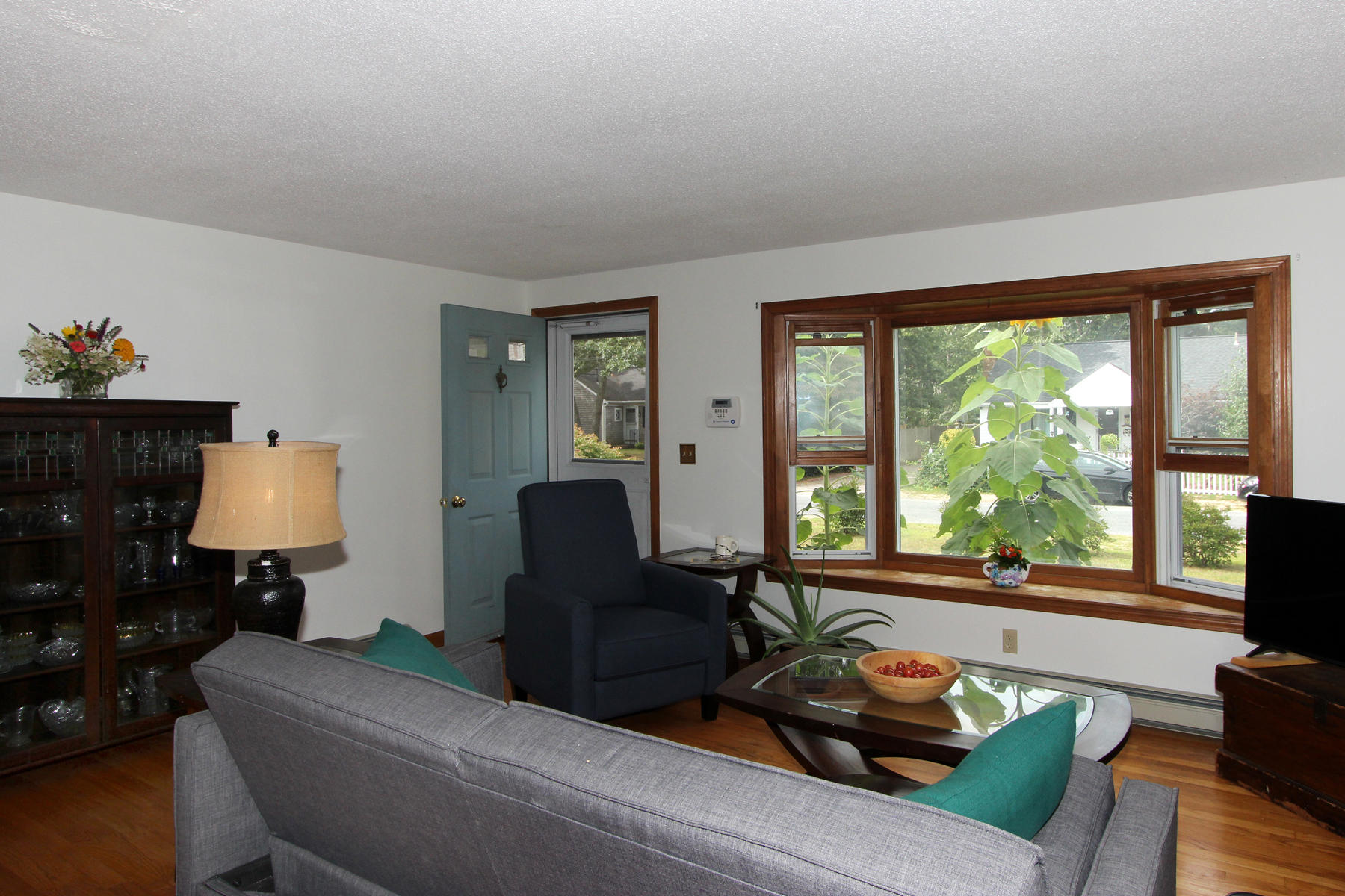 58 Colburne Path West Yarmouth, MA 02673 - Photo 17 of 39 a living room with furniture and a large window