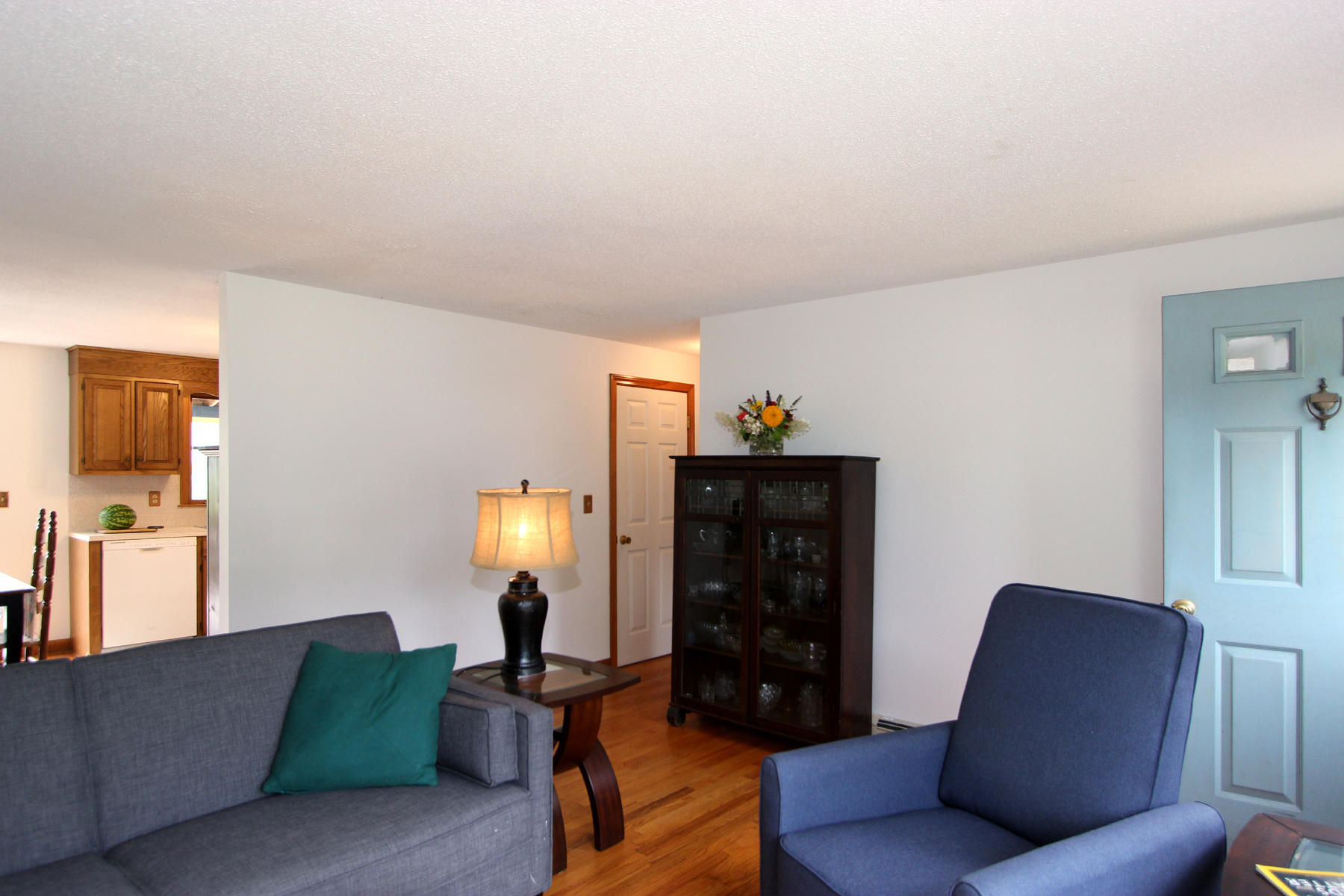 58 Colburne Path West Yarmouth, MA 02673 - Photo 22 of 39 a living room with furniture and a lamp