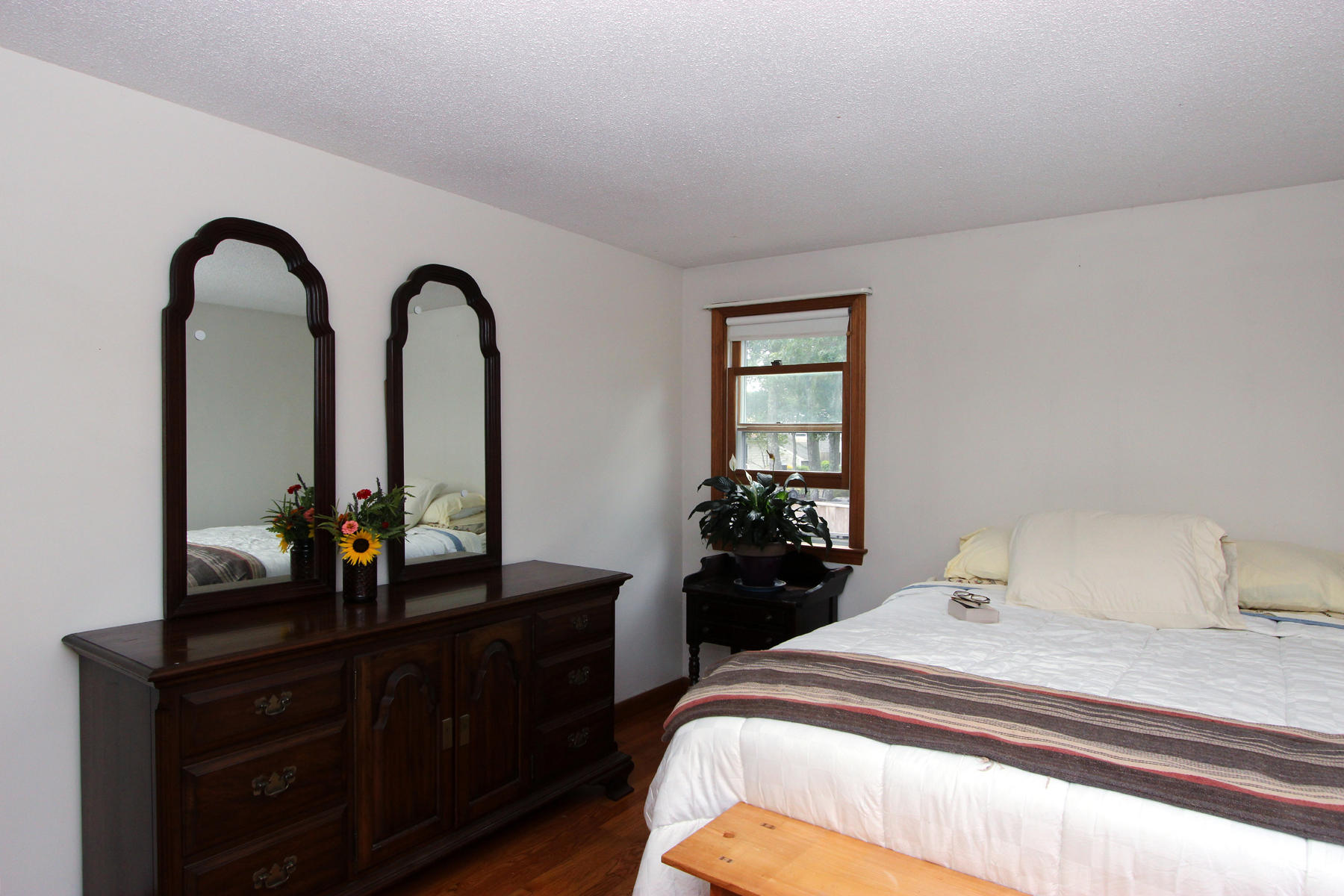 58 Colburne Path West Yarmouth, MA 02673 - Photo 26 of 39 a bedroom with a bed and a dresser