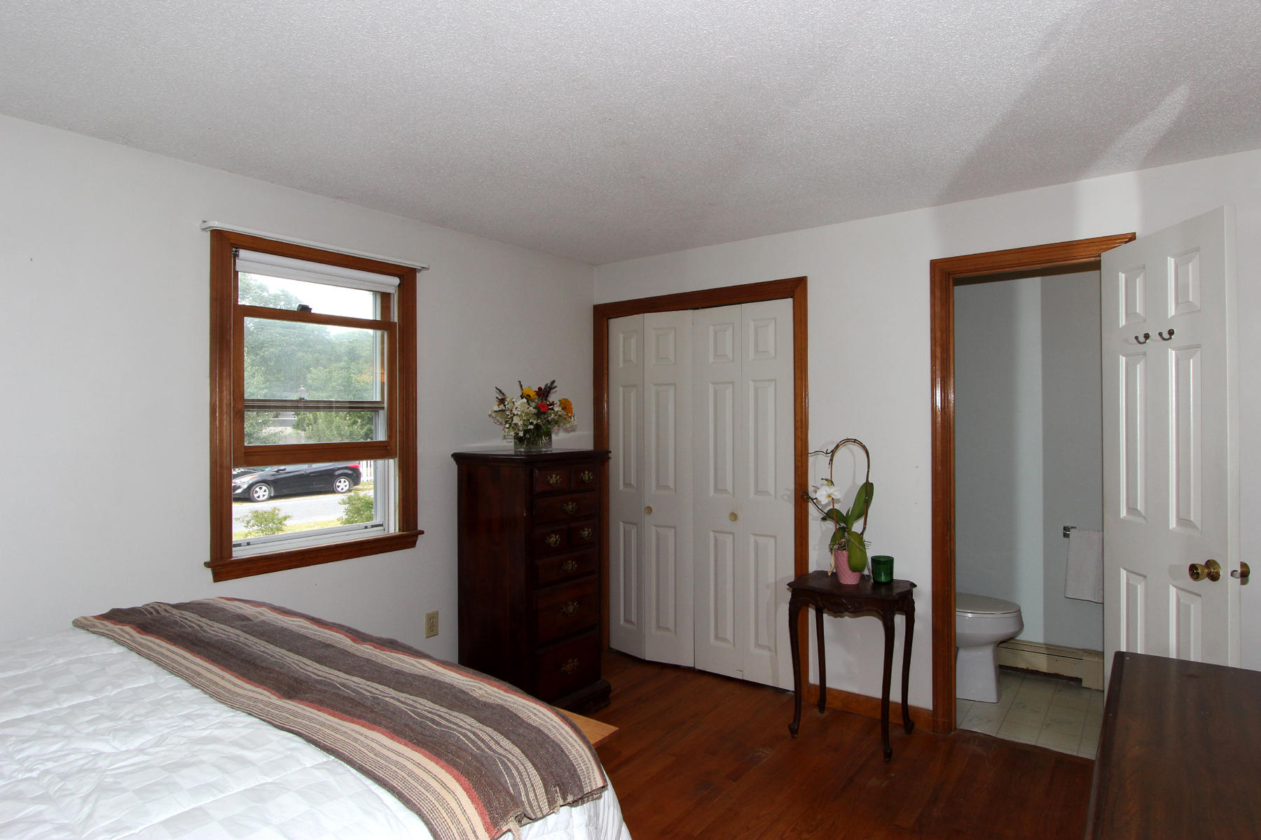 58 Colburne Path West Yarmouth, MA 02673 - Photo 27 of 39 a bedroom with a bed and a window