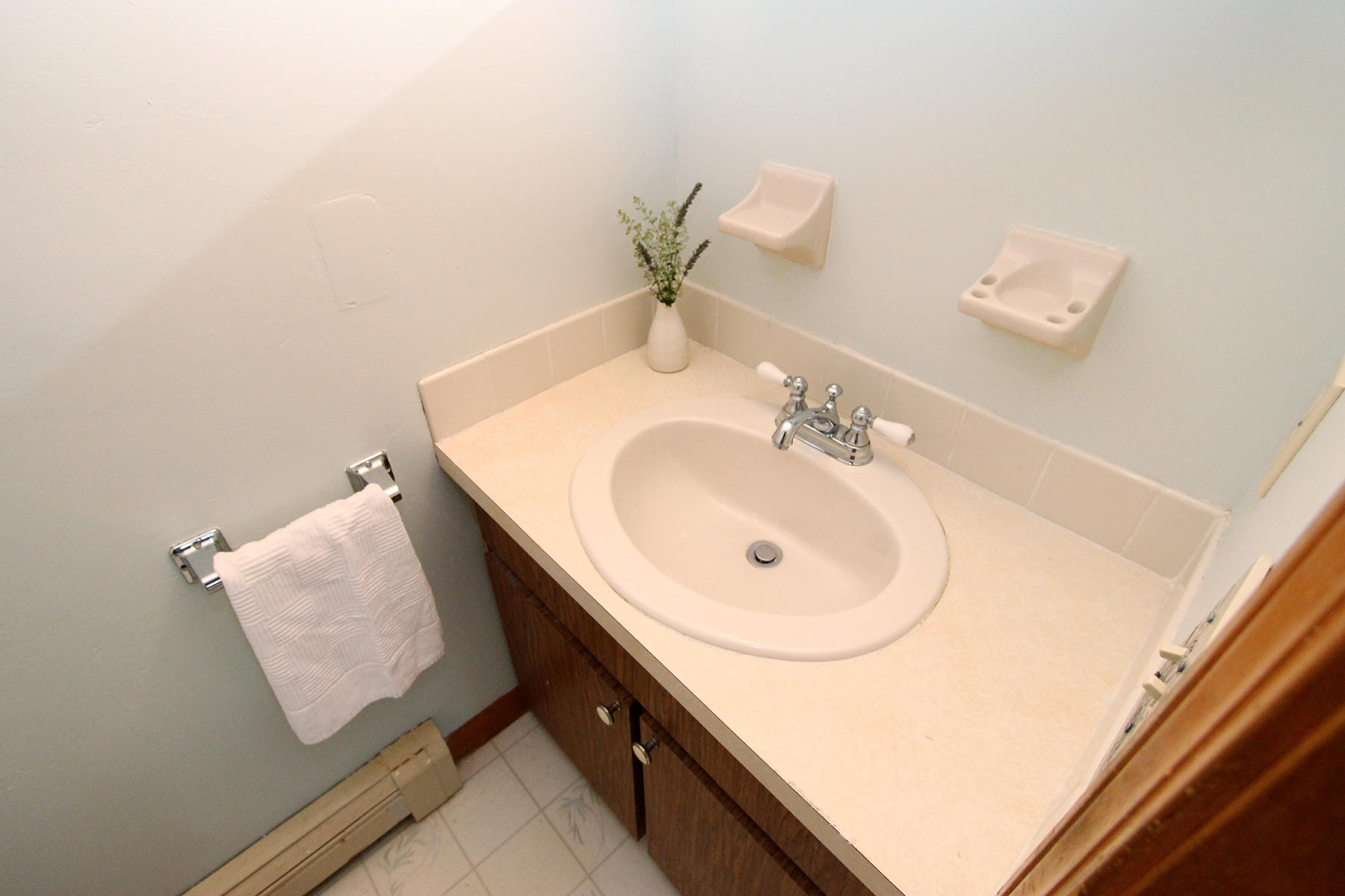 58 Colburne Path West Yarmouth, MA 02673 - Photo 29 of 39 a bathroom with a sink and a mirror